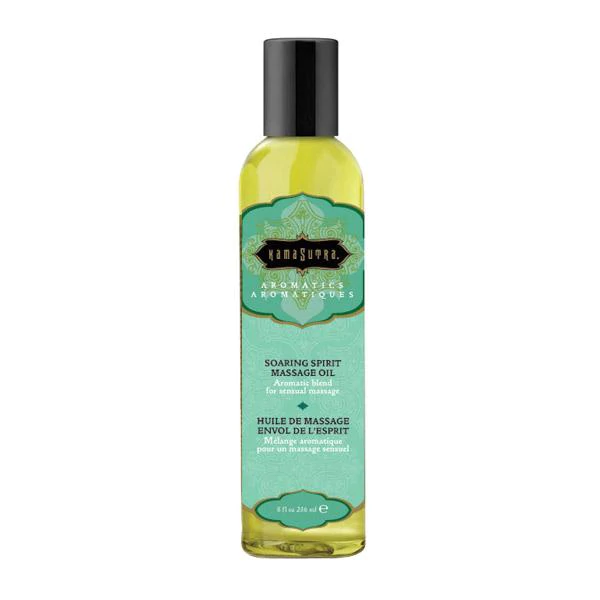 Kama Sutra Soaring Spirit massage oil in a clear bottle with a teal label.