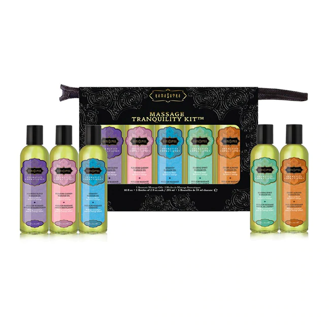 Aromatherapy massage oil travel kit with five bottles and a zippered case.