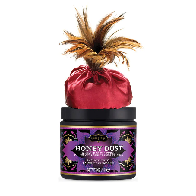 Kama Sutra Honey Dust Raspberry Kiss body powder with a feather applicator.