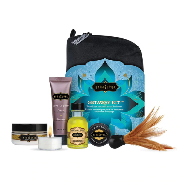 Kama Sutra travel kit with body oil, lube, powder, tickler, candle, and bag.