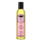 Kama Sutra Aromatics Sensual Massage Oil in a clear bottle with a pink label.