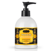 Kama Sutra Coconut Pineapple Sensual Massage Lotion in a white pump bottle.