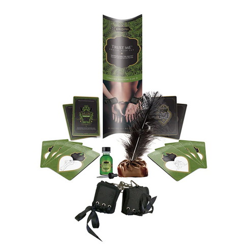 Kama Sutra erotic bondage playset with handcuffs, feather, and cards.