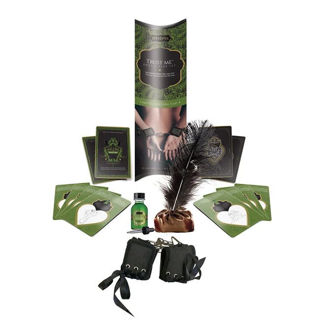 Kama Sutra erotic bondage playset with handcuffs, feather, and cards.
