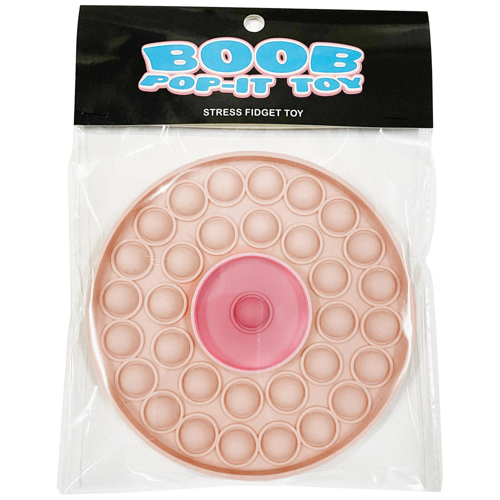A pink, round pop-it fidget toy with a nipple design in the center.