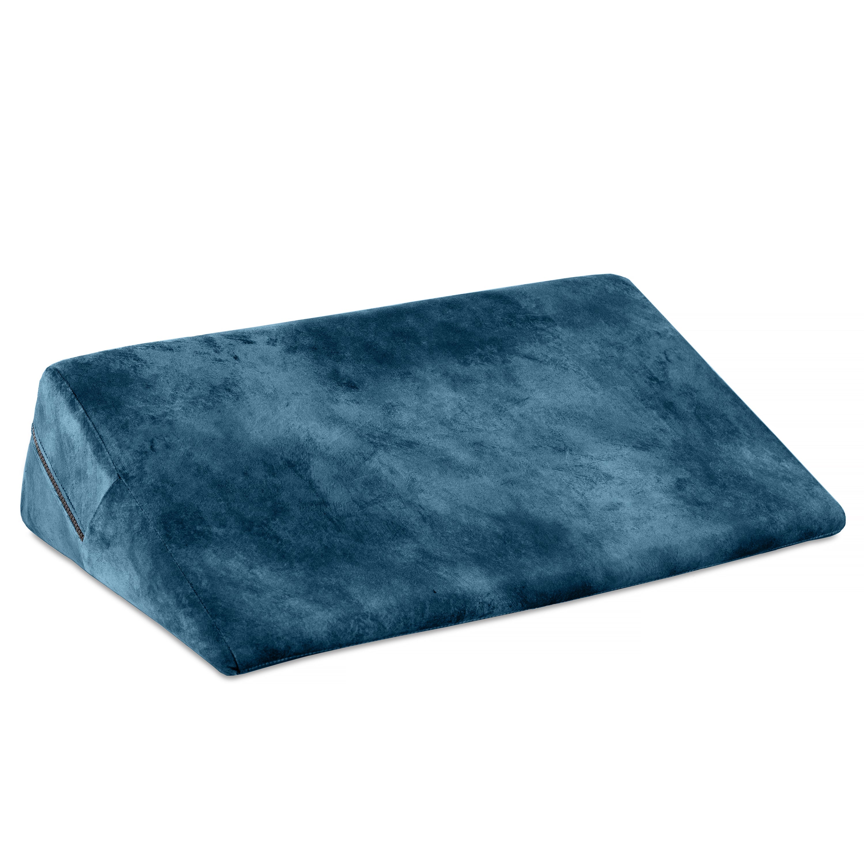Ocean blue velvet wedge pillow with a textured surface.