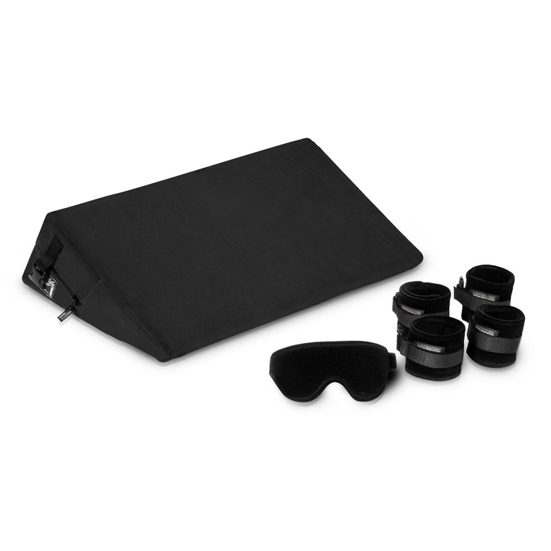 Black microfiber positioning wedge with cuffs and blindfold.