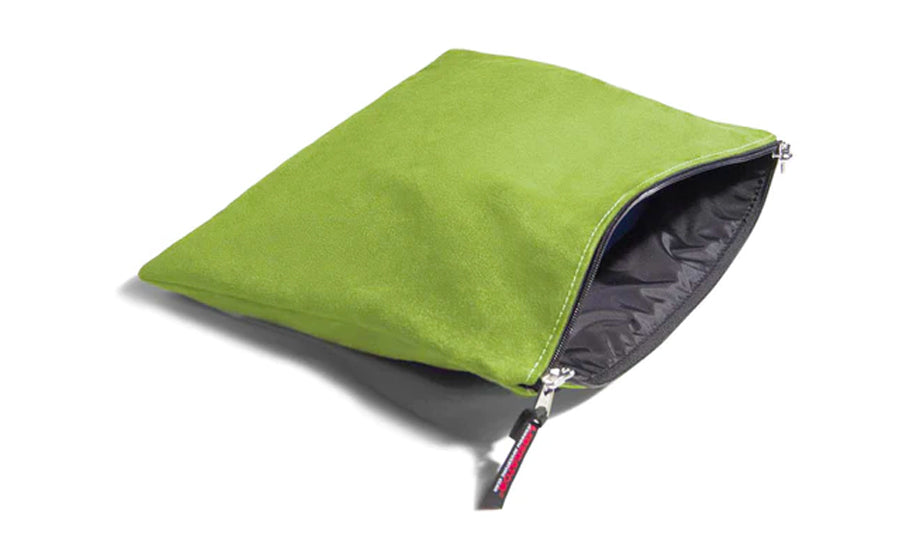 Lime green microsuede toy storage bag with a lockable zipper.