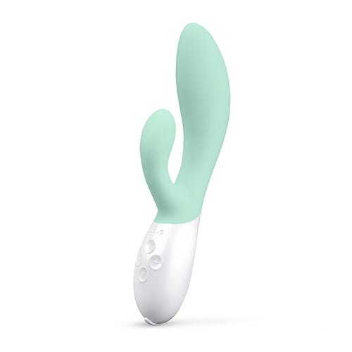 A mint green and white dual-action rabbit vibrator with control buttons.