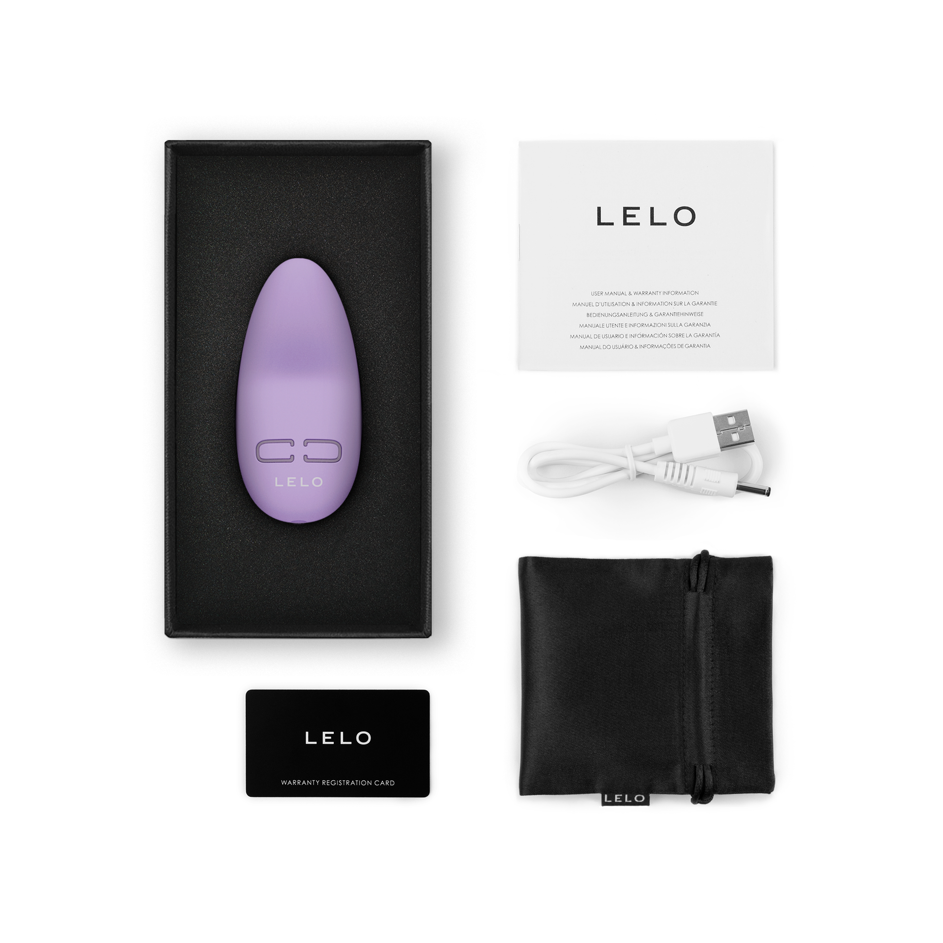 A lavender Lily 3 personal massager with charging cable, pouch, and warranty card.
