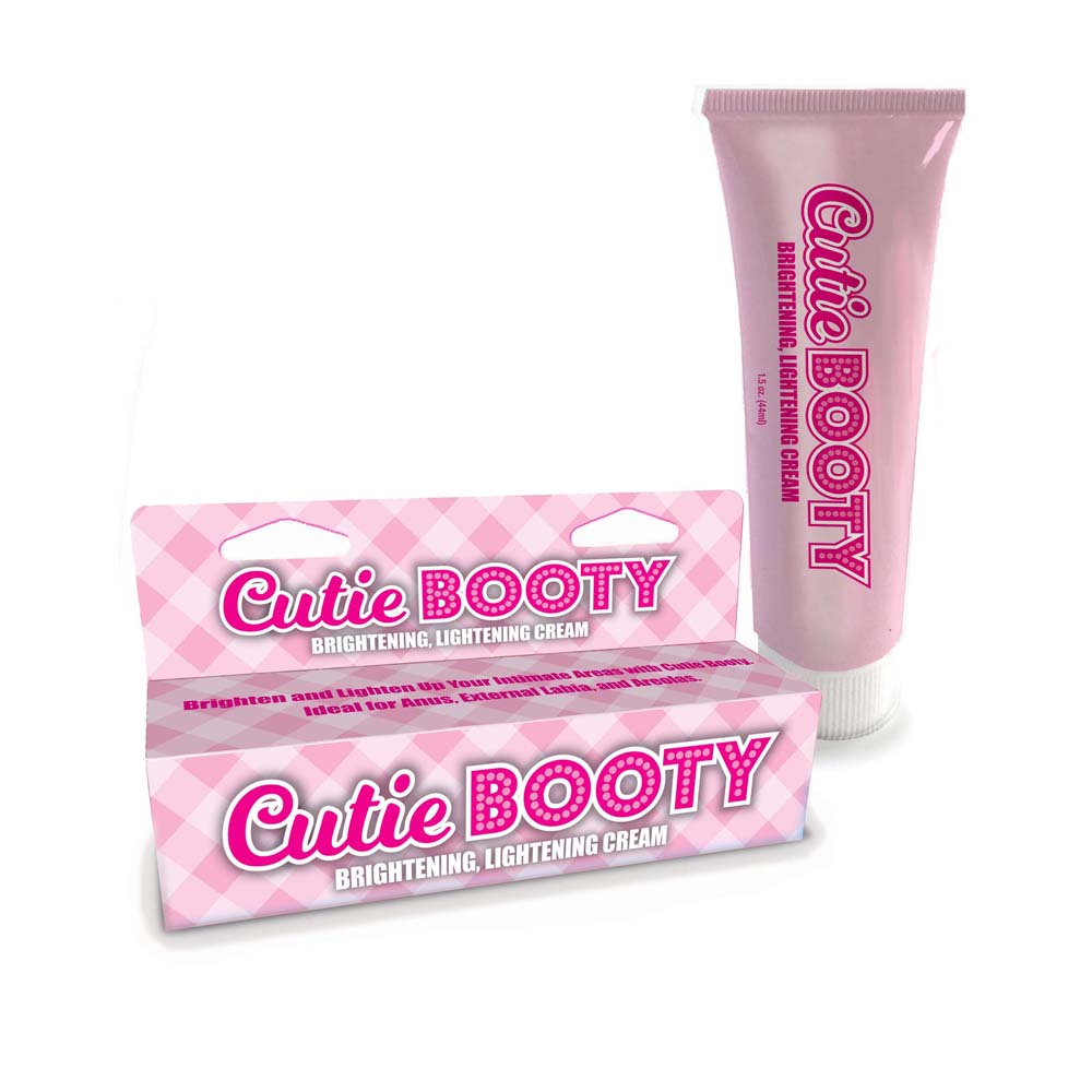 Cutie Booty brightening and lightening cream in a pink tube and box.