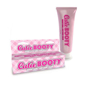 Cutie Booty brightening and lightening cream in a pink tube and box.
