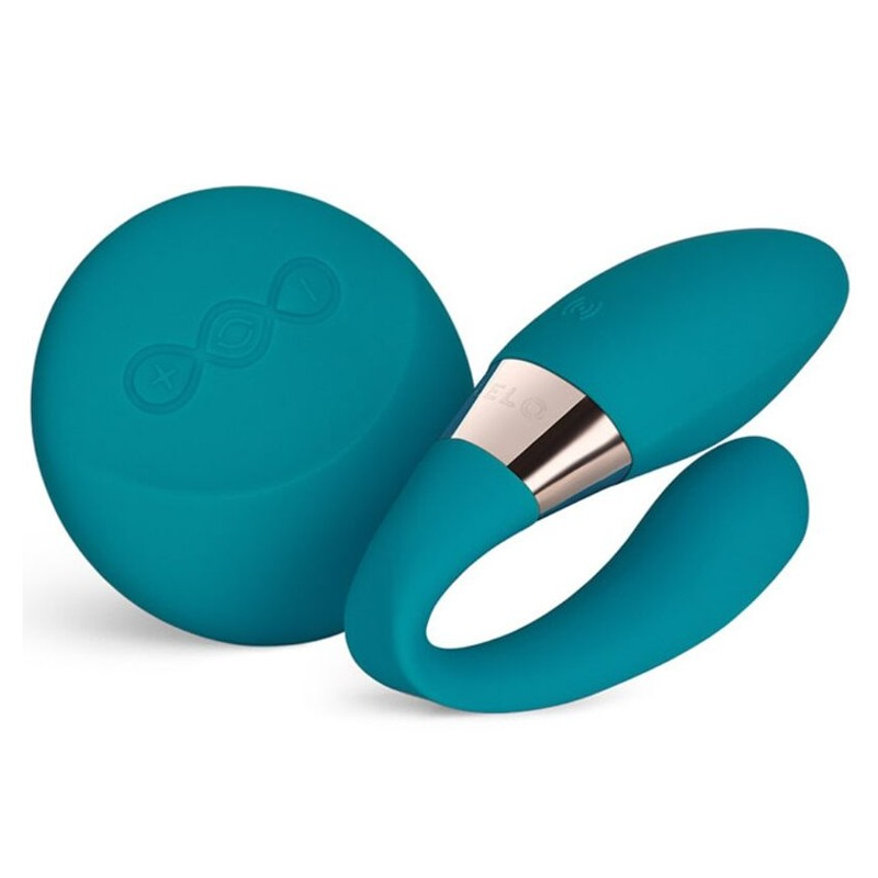 A teal couples massager with a remote control.