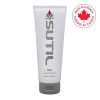 Sutil Luxe water-based personal lubricant in a white tube with a grey cap.
