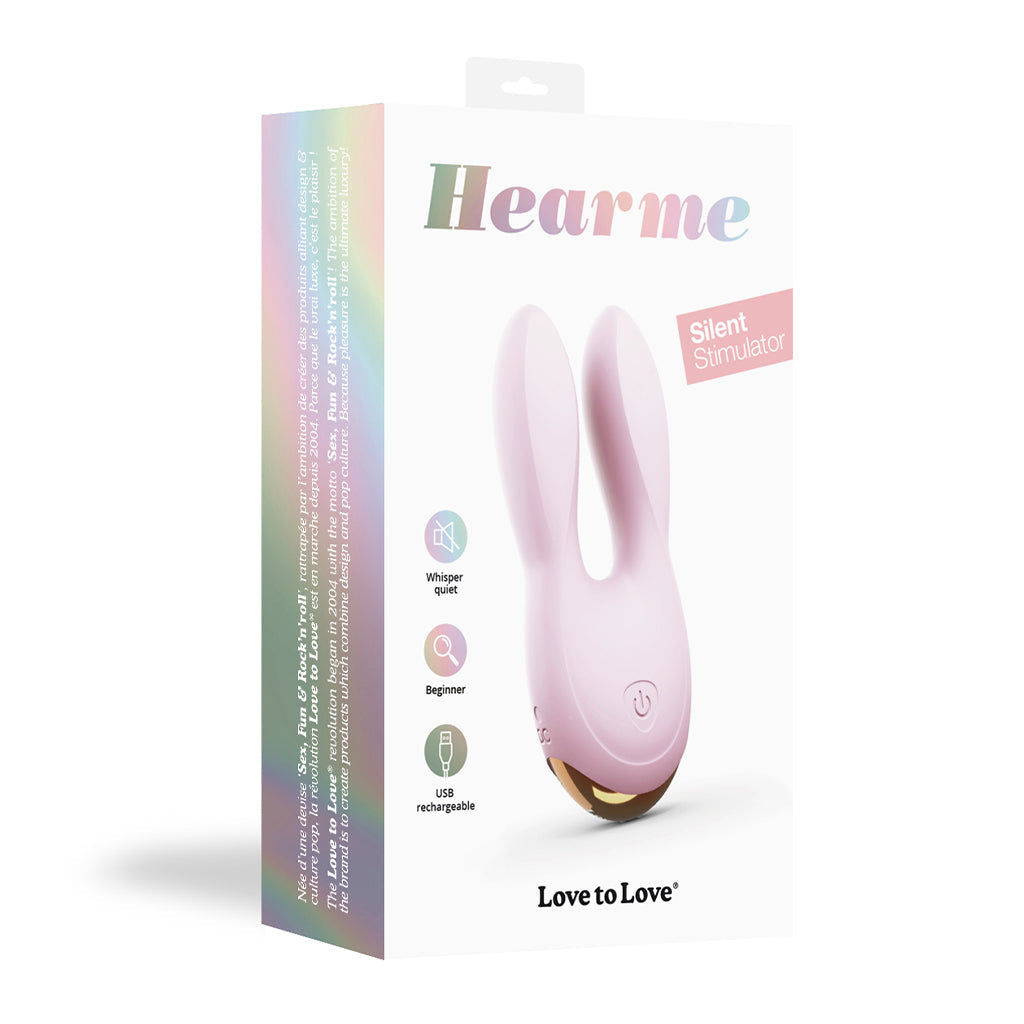 Pink Hear Me dual motor silicone clitoral vibrator with bunny ears.