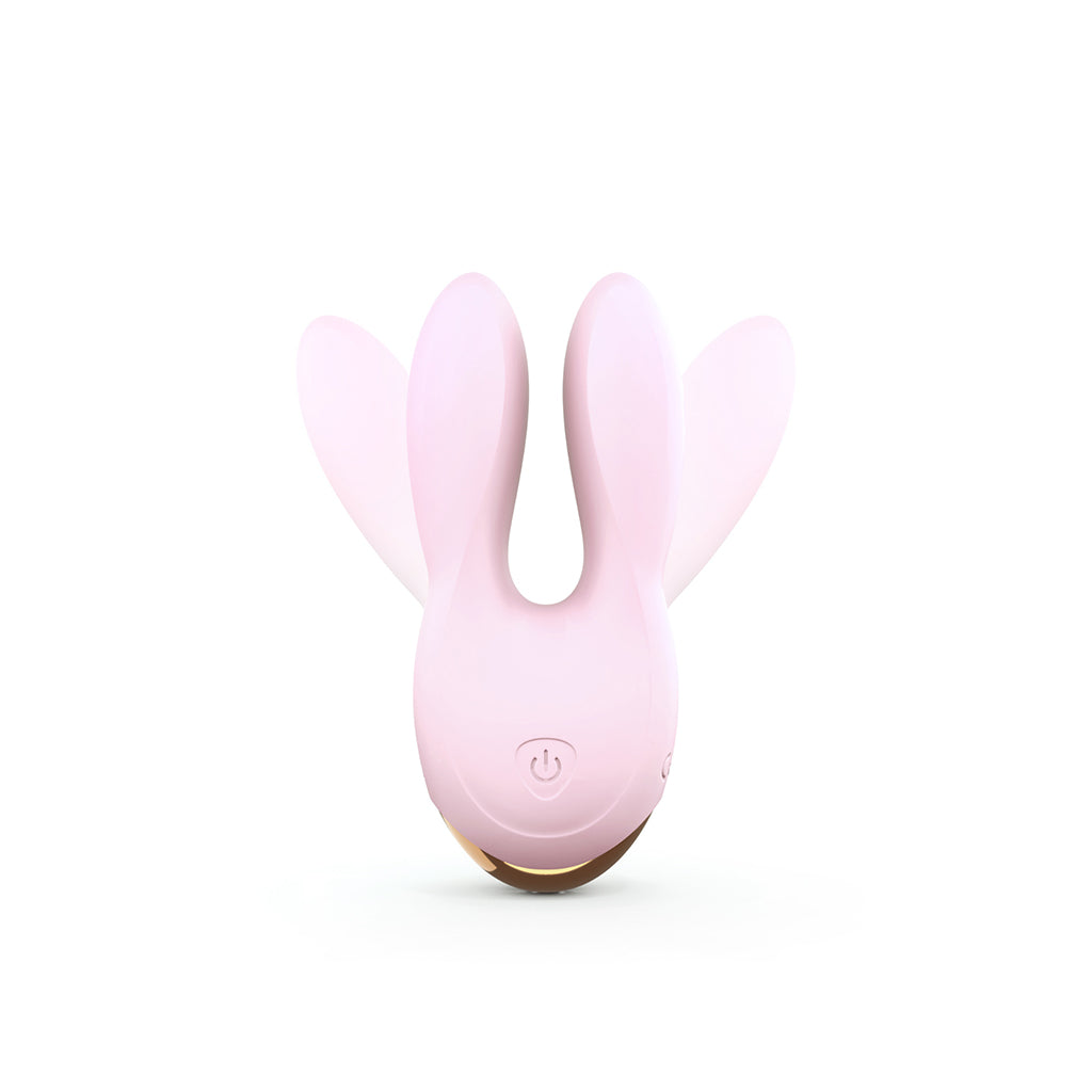 Pink dual motor silicone clitoral vibrator with bunny ears.