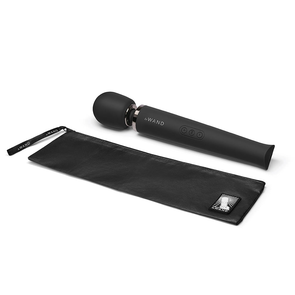 A black rechargeable wand massager with a travel case.