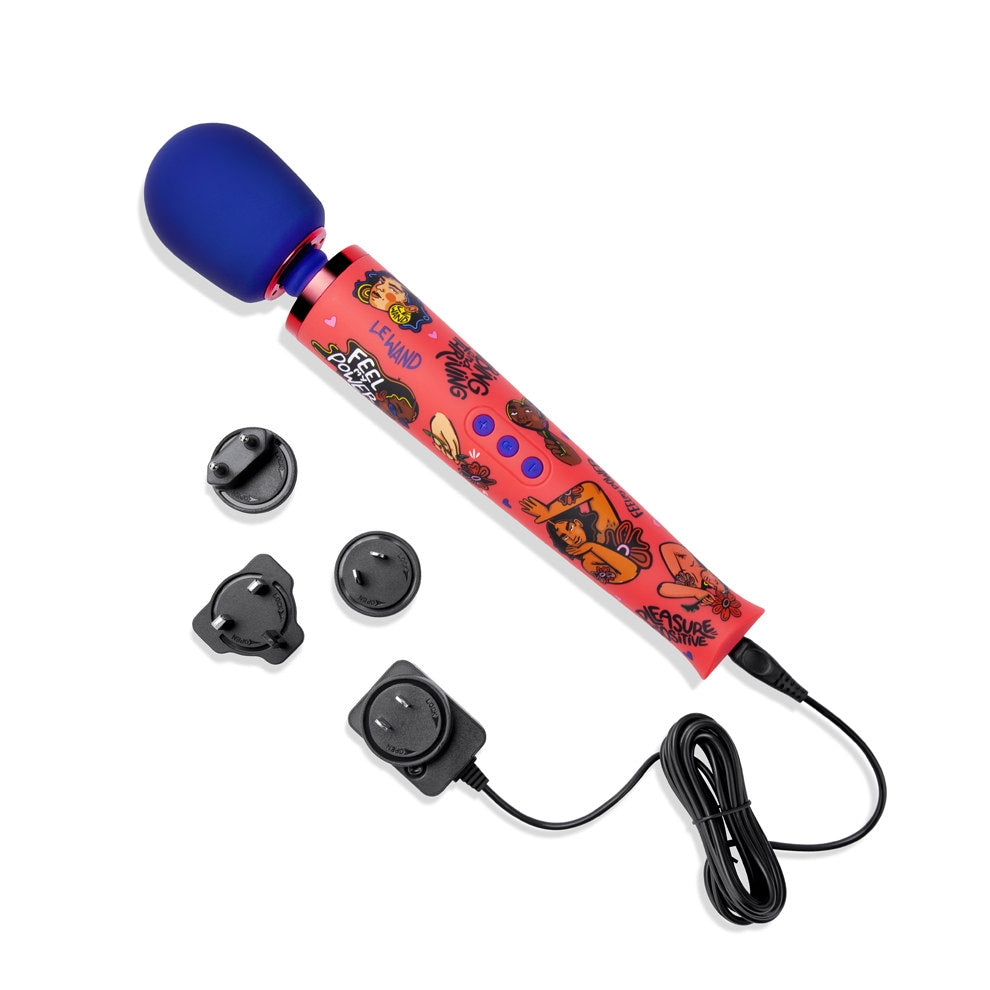 A red silicone wand vibrator with blue tip and accessories.