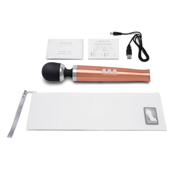 Rose gold rechargeable wand massager with charging cable, instructions, and storage pouch.