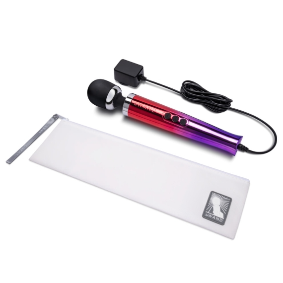 A metallic wand massager with a red and purple gradient, a black head, and a charging cord.