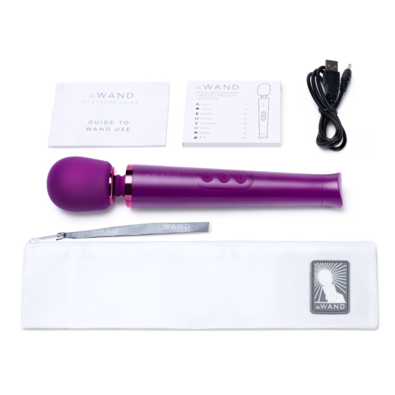 Purple rechargeable wand vibrator with accessories.