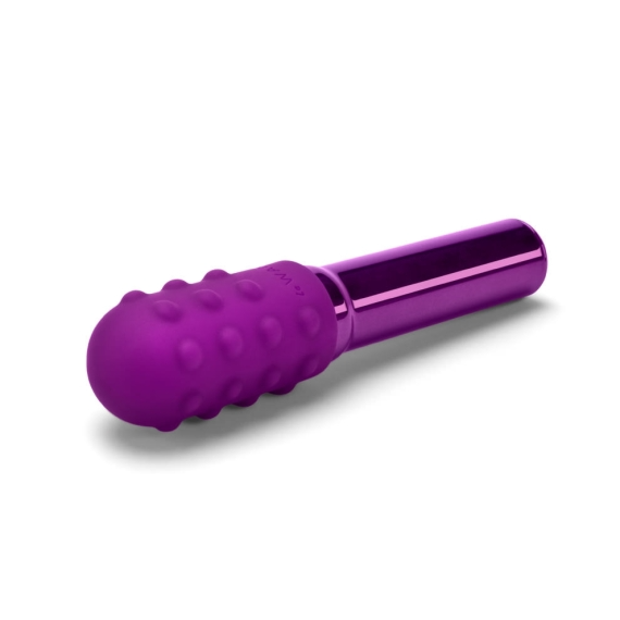 A purple bullet vibrator with a textured silicone head and a smooth metallic handle.