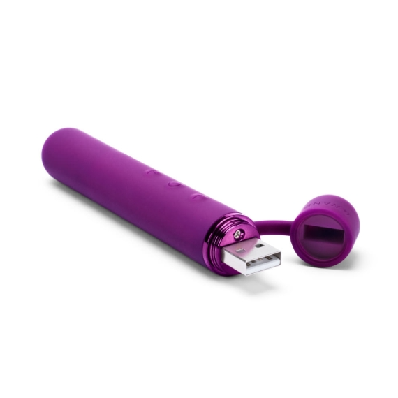 Purple slim vibrator with a USB charging port and detached cap.
