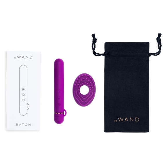 A purple Le Wand Baton vibrator with a charging pouch and a ring attachment.