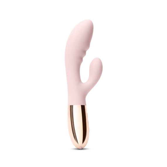 A pink rabbit vibrator with a rose gold base.