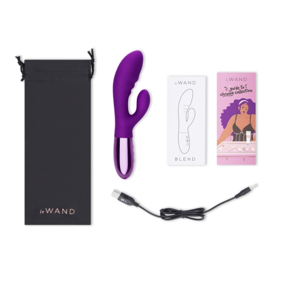 A purple rabbit vibrator with a charging cable and two instruction booklets.