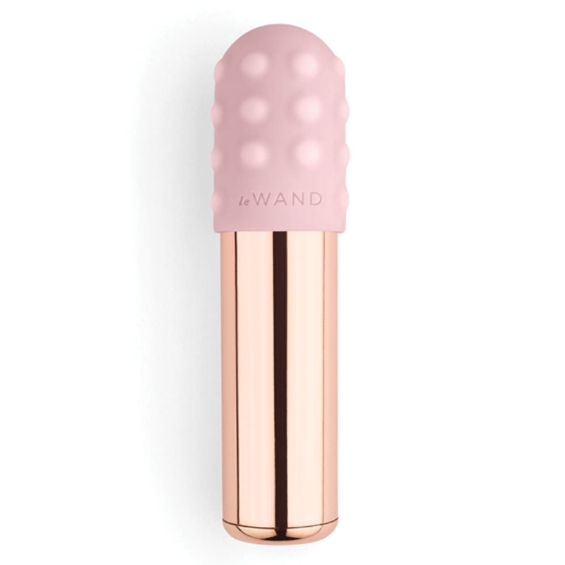A rose gold bullet vibrator with a pink textured head.