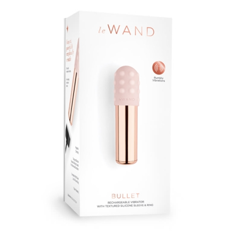 Rose gold rechargeable bullet vibrator with textured silicone sleeve.
