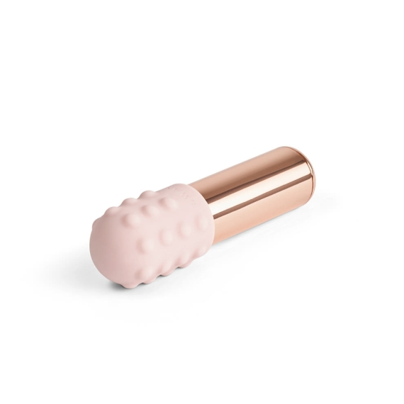 Rose gold bullet vibrator with a textured pink silicone tip.