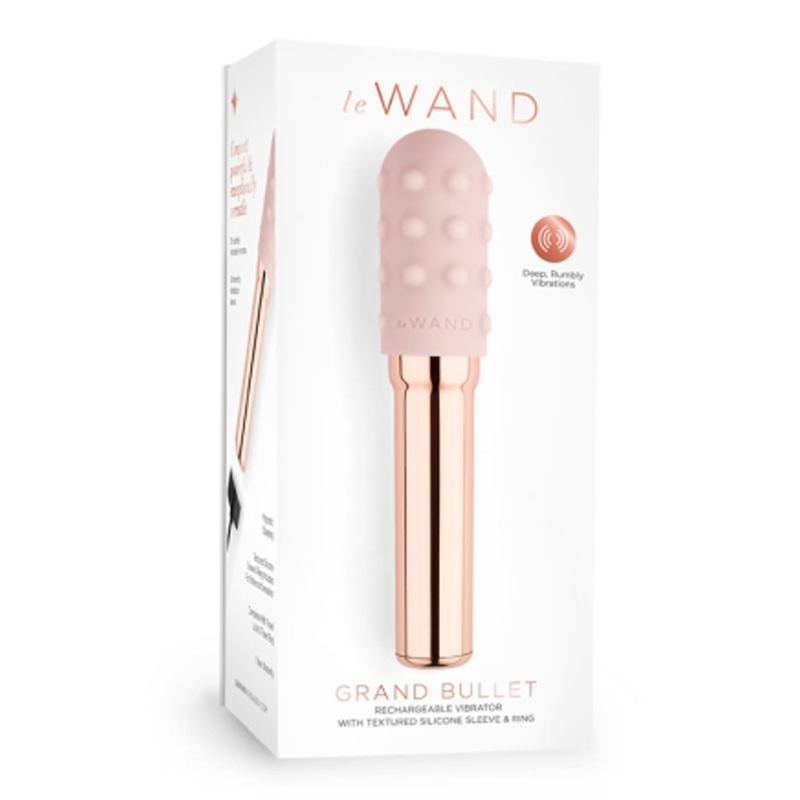 Le Wand Grand Bullet rechargeable vibrator in rose gold with textured silicone.