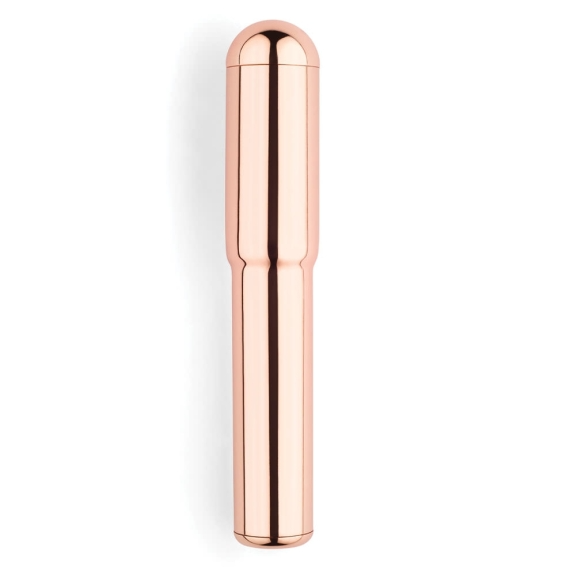 Rose gold rechargeable vibrator with a tapered top.