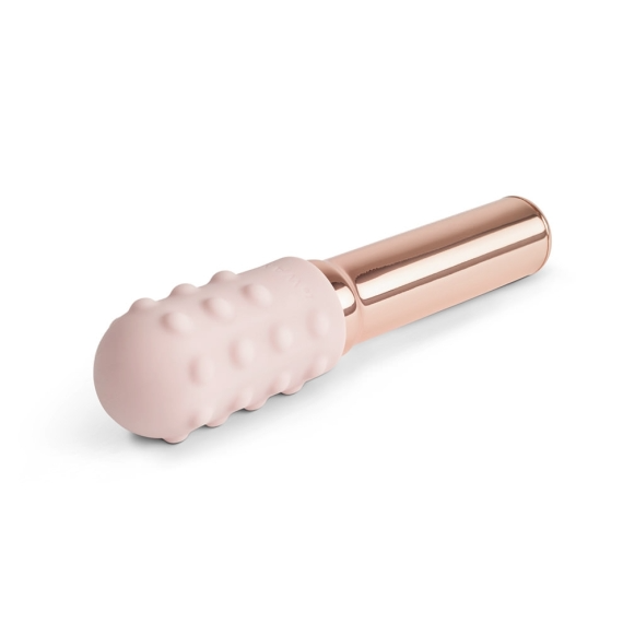 Rose gold rechargeable vibrator with a textured pink silicone head.