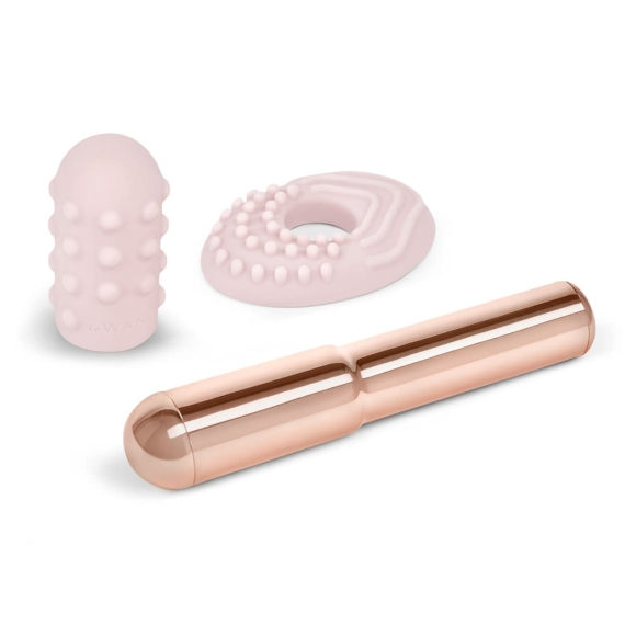 Rose gold vibrator with textured sleeves.