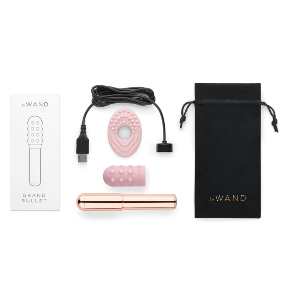 Rose gold rechargeable vibrator with accessories and storage pouch.