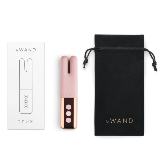 Rose gold and pink mini vibe with a black pouch and box.