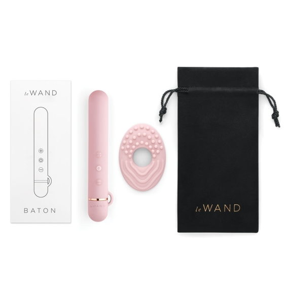 Pink mini vibrator with textured ring and black pouch.