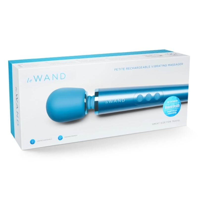 A blue Le Wand petite rechargeable vibrating massager in its box.