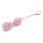 Pink silicone yoni egg with rose quartz inserts and a retrieval loop.