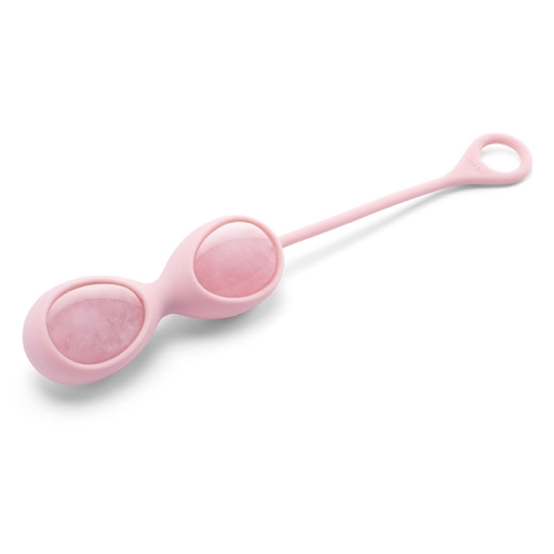 Pink silicone yoni egg with rose quartz inserts and a retrieval loop.