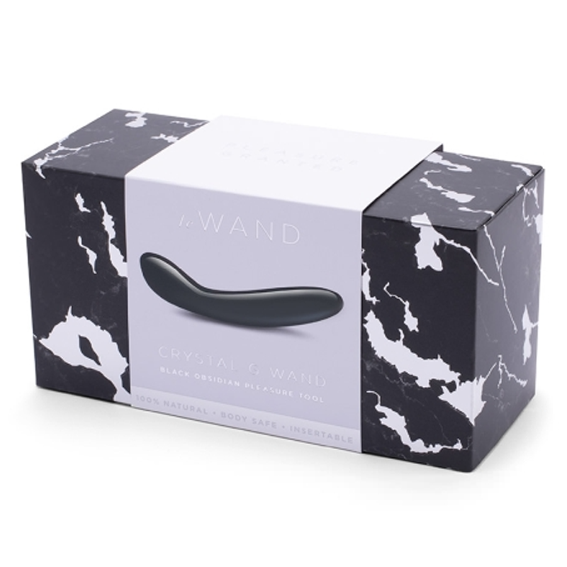 Black Obsidian G-spot wand with a curved design on a marble-patterned box.