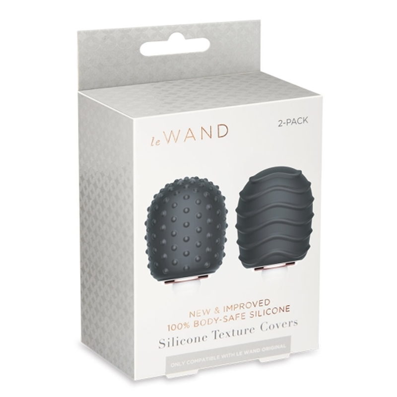 Two silicone texture covers for a Le Wand massager, one with raised dots and one with wavy ridges.