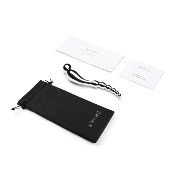 Stainless steel dual-ended anal and prostate plug with a storage pouch and care cards.