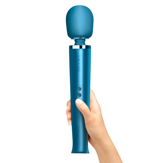 A Pacific Blue rechargeable wand massager held by a hand.