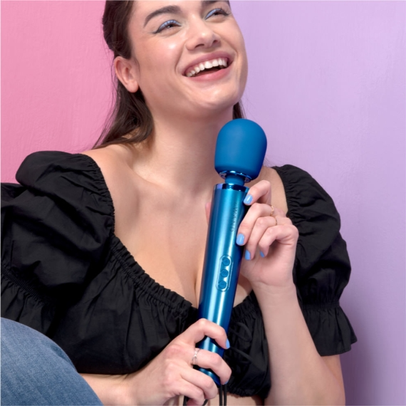 A blue rechargeable wand massager with a silicone head.