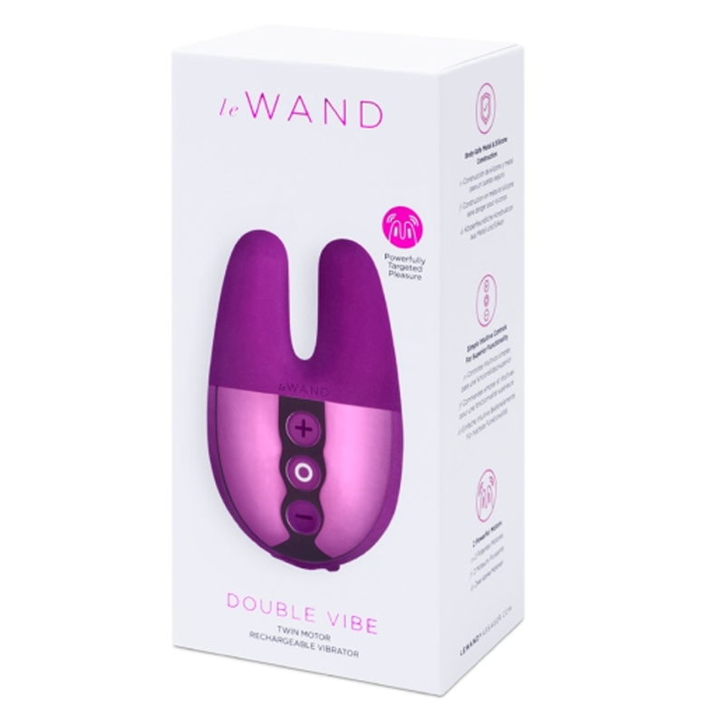 A purple Le Wand Double Vibe vibrator on its packaging.
