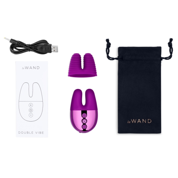 A purple rechargeable rabbit vibrator with a charging cable, instruction manual, and storage pouch.